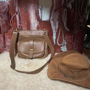 Roots Tribe leather saddle bag